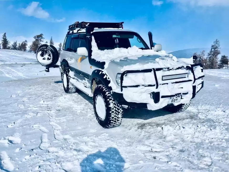 Experienced Driver In Western Mongolia In Land Cruiser